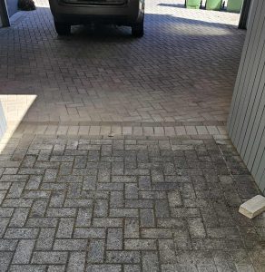 Pressure cleaning to driveway before picture